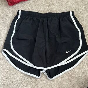 Nike Black and White Athletic Shorts with Dolphin Hem